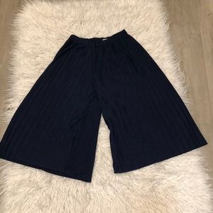 Dark blue baggy pants.